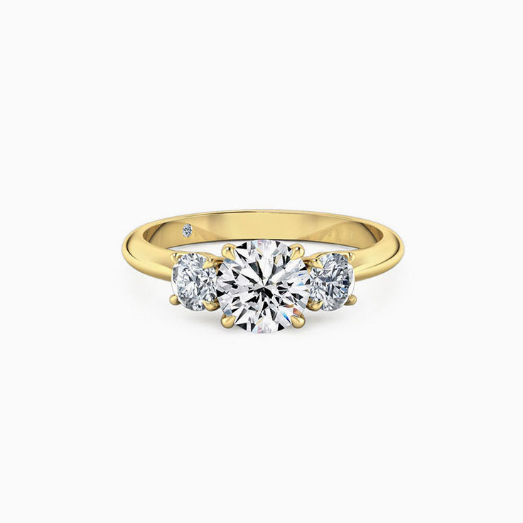 Round Brilliant Cut In a trilogy setting  Engagement Ring