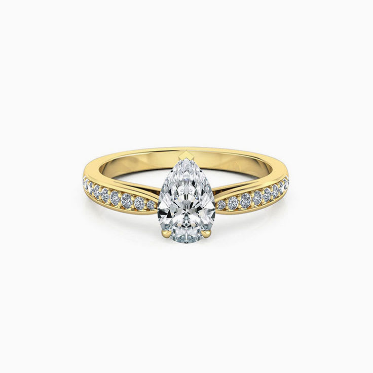 Pear cut diamond engagement ring on a diamond band