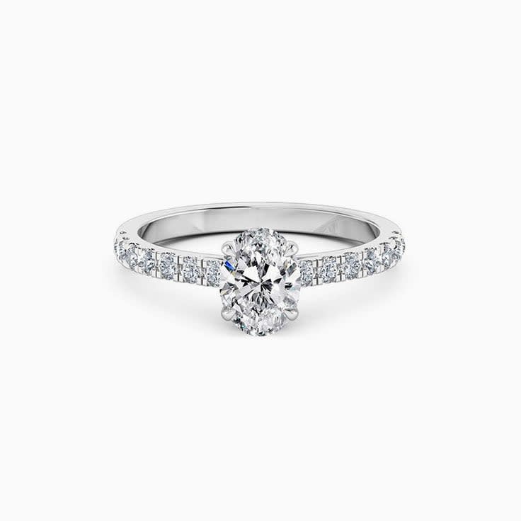 Oval cut diamond engagement ring set on a diamond band