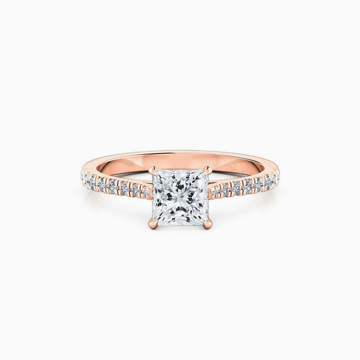 Princess cut diamond in four claw set engagement ring