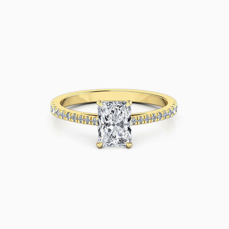 Radiant cut diamond engagement ring on a diamond band