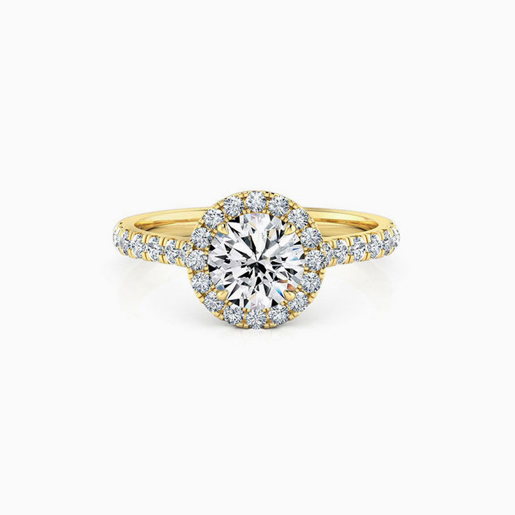 Round halo on cathedral setting engagement ring