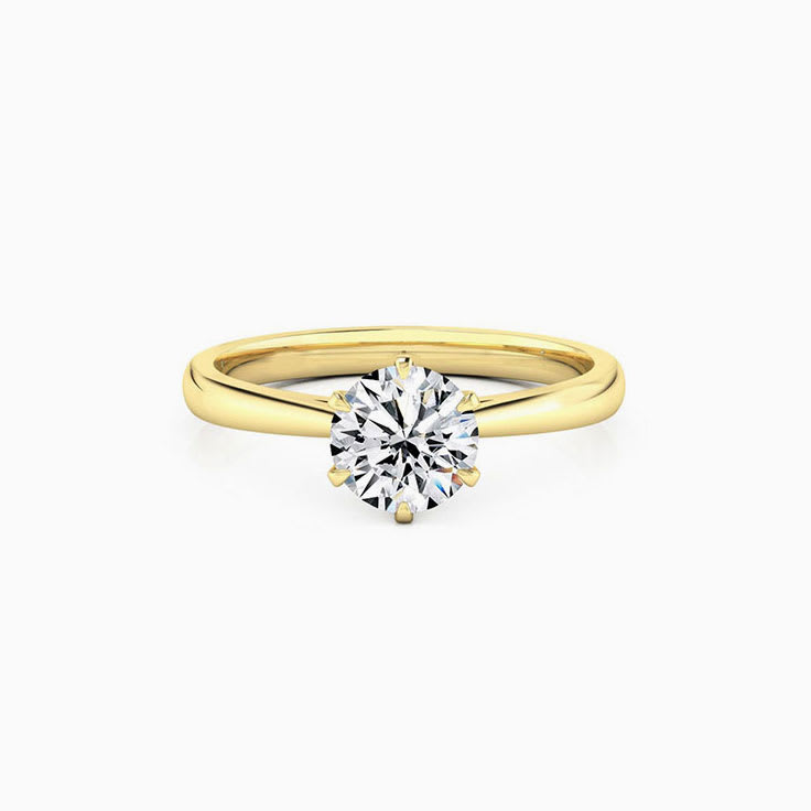 Round Brilliant cut with a cathedral setting engagement ring