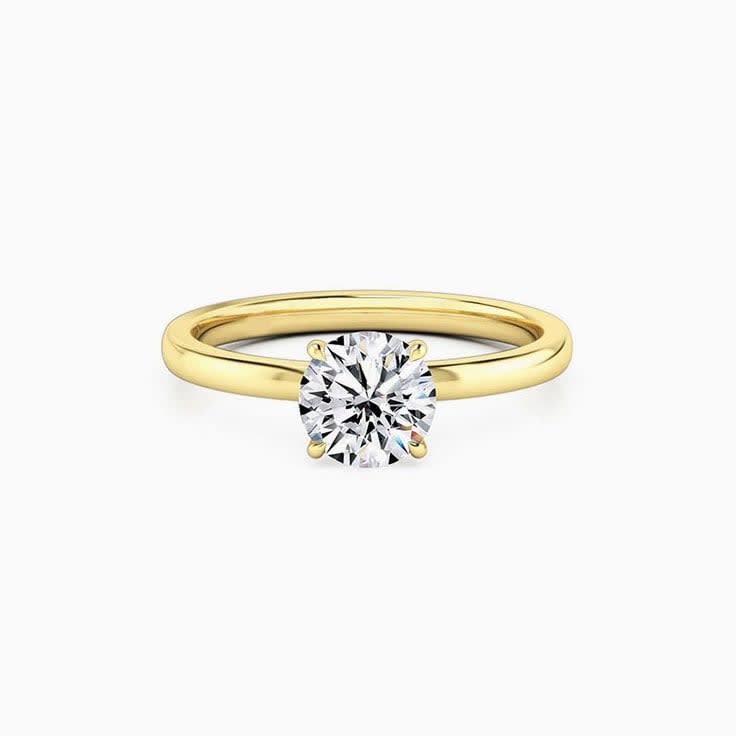 Round Brilliant Cut on a plain band Engagement Ring