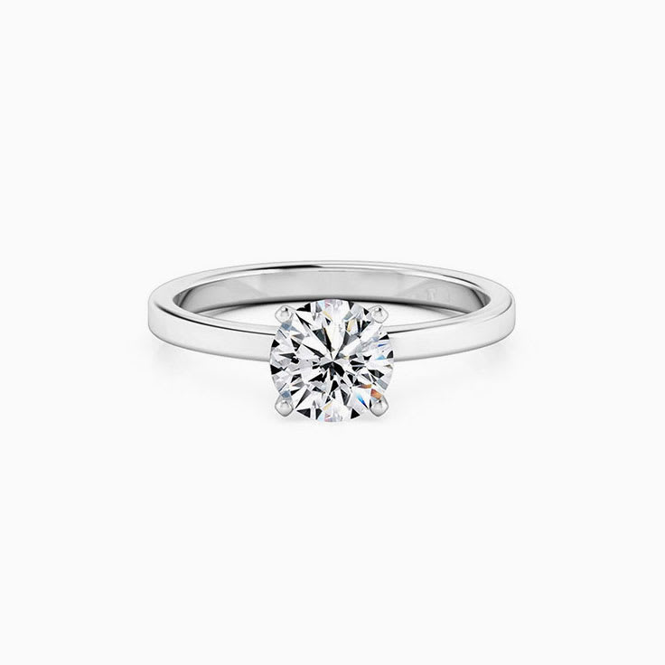 Round Brilliant Cut Engagement Ring With a Flat Plain Band
