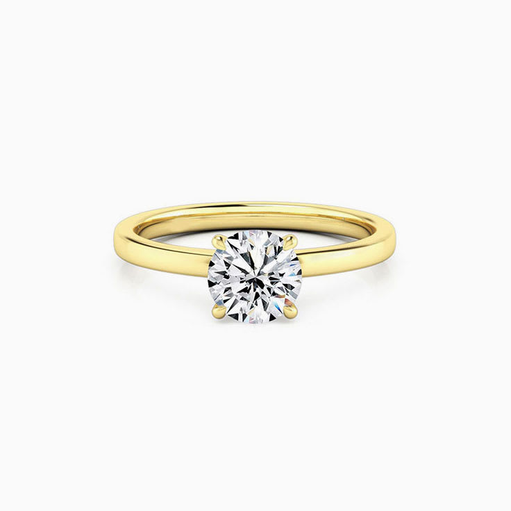 Round Brilliant Cut With Four Claw Engagement Ring