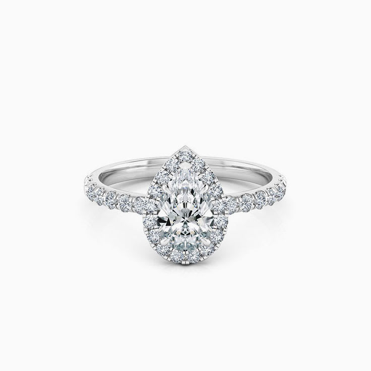 Pear cut diamond engagement ring with halo
