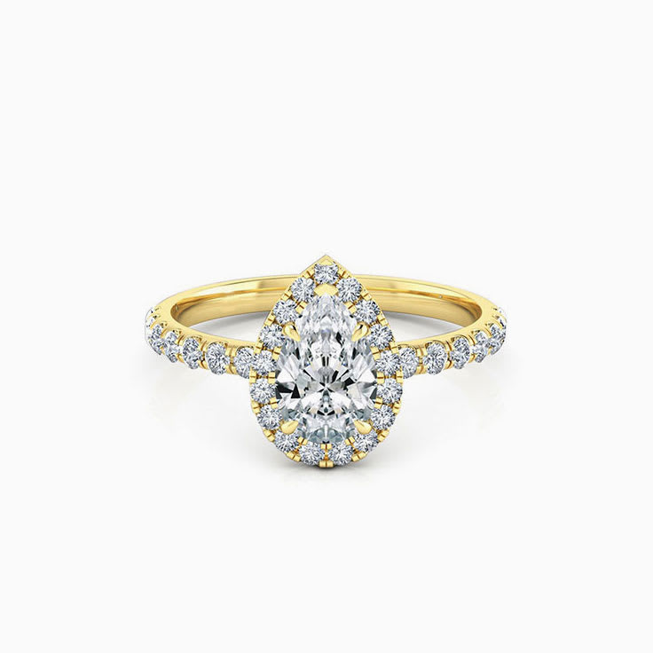 Pear cut diamond engagement ring with halo