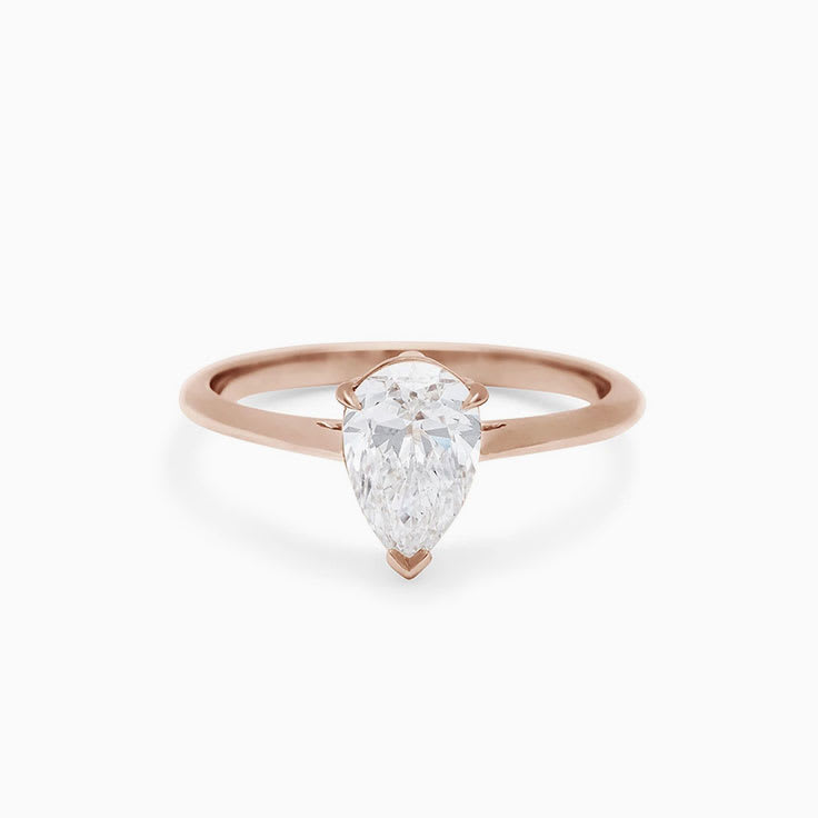 Pear cut solitaire engagement ring