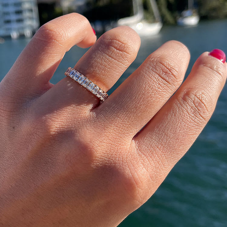 Emerald cut diamond set halfway