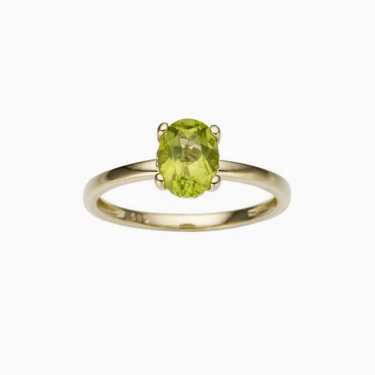 Solitaire peridot engagement ring