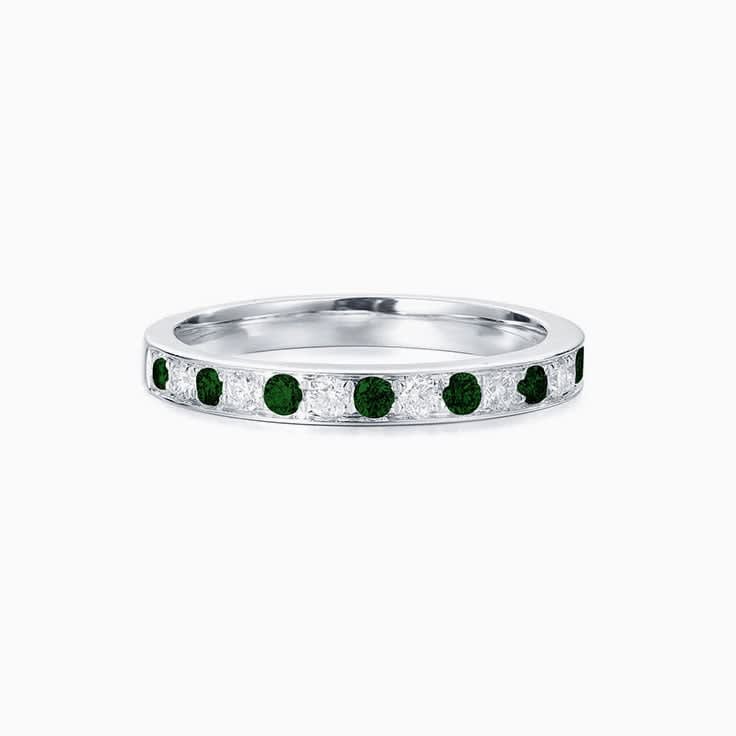 Emerald and pave band