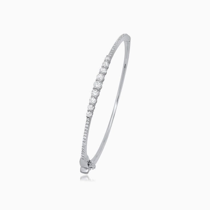 Claw set diamond bangle