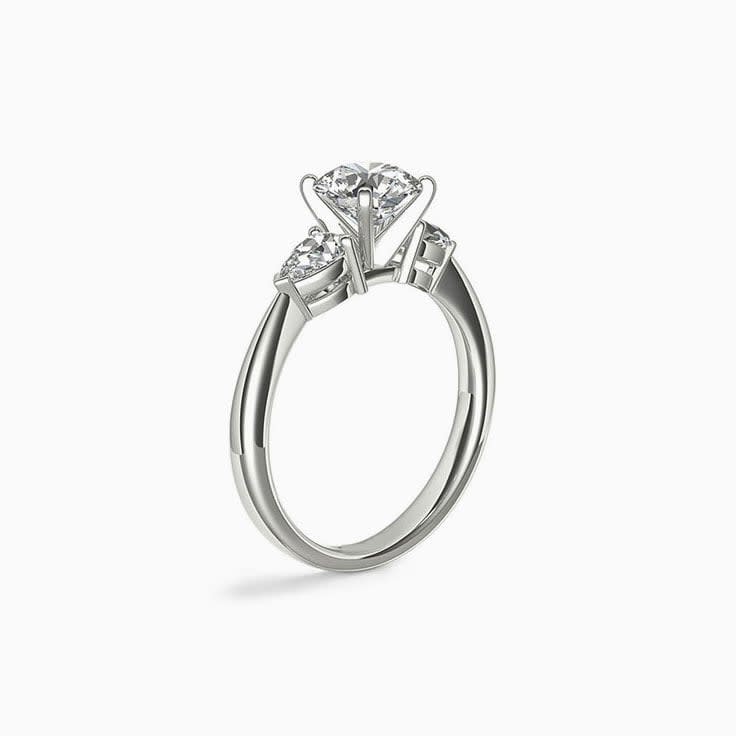 Brilliant Round And Pear Diamond Engagement Ring