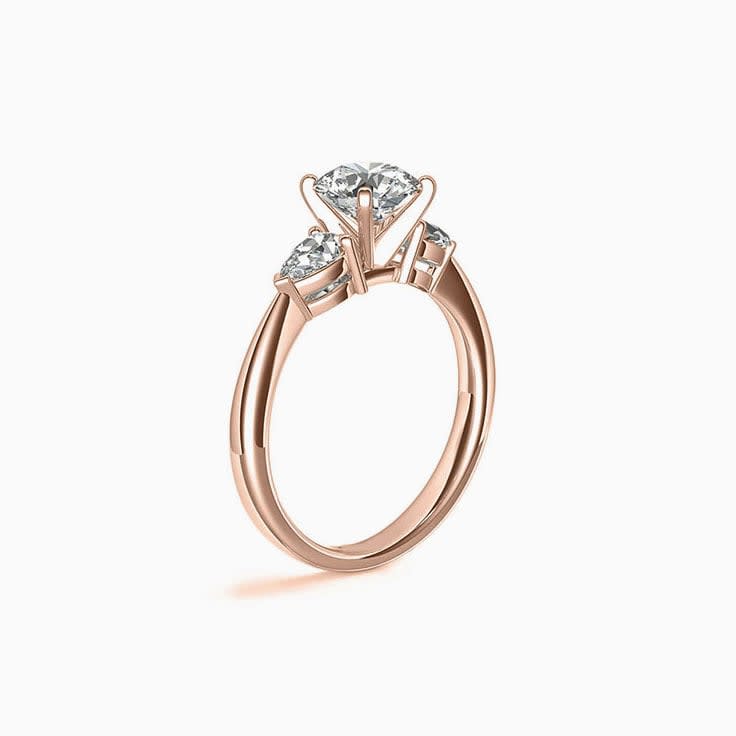 Brilliant Round And Pear Diamond Engagement Ring