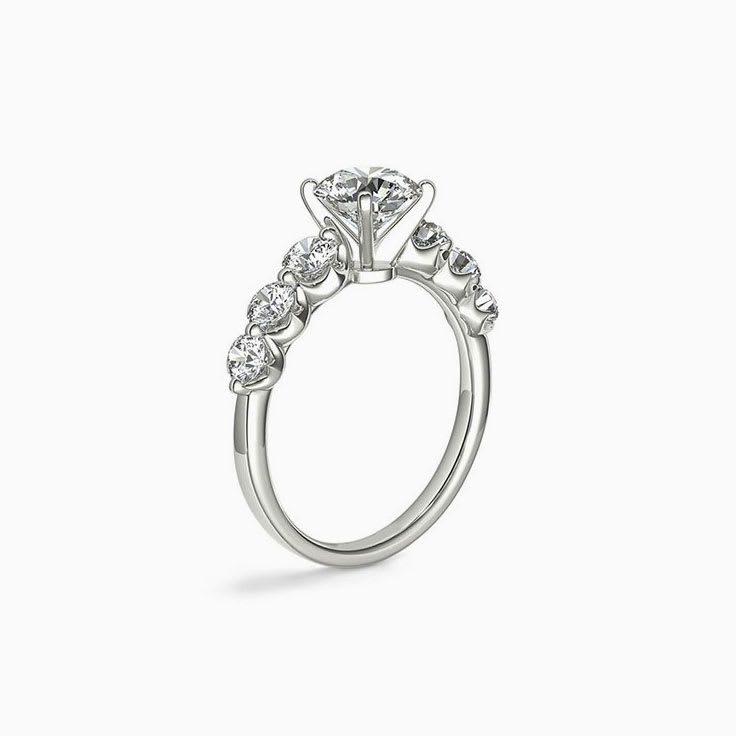 Claw Set Diamond Engagement Side Stone Ring