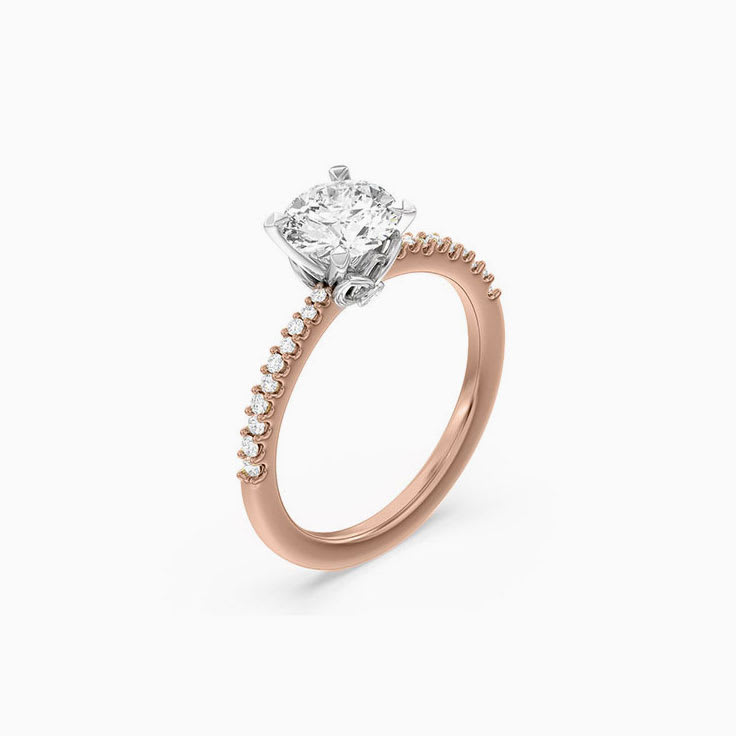 Classic round diamond set in four claw
