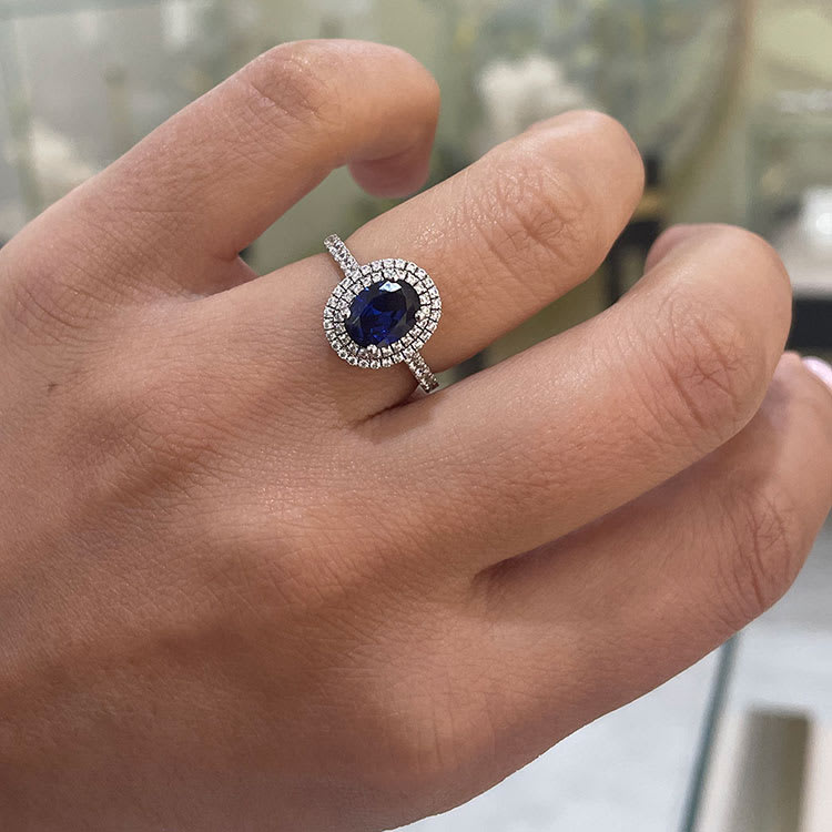 Blue sapphire with double halo ring