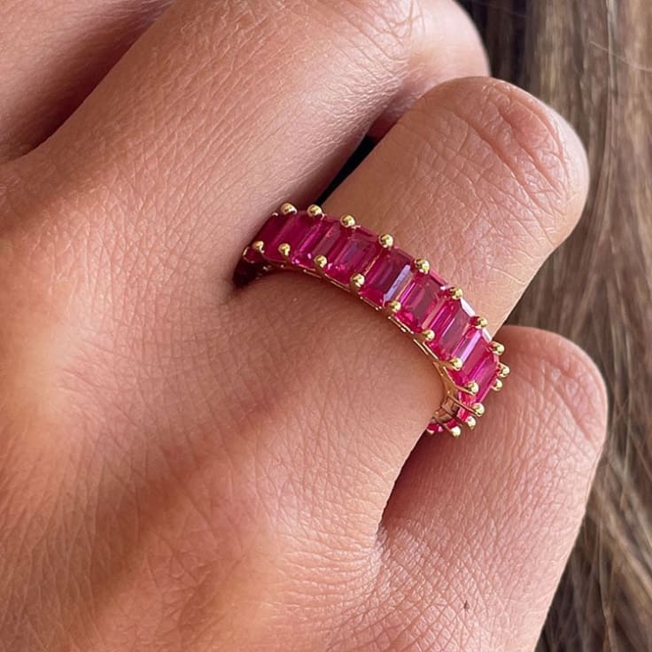 Emerald cut ruby eternity ring