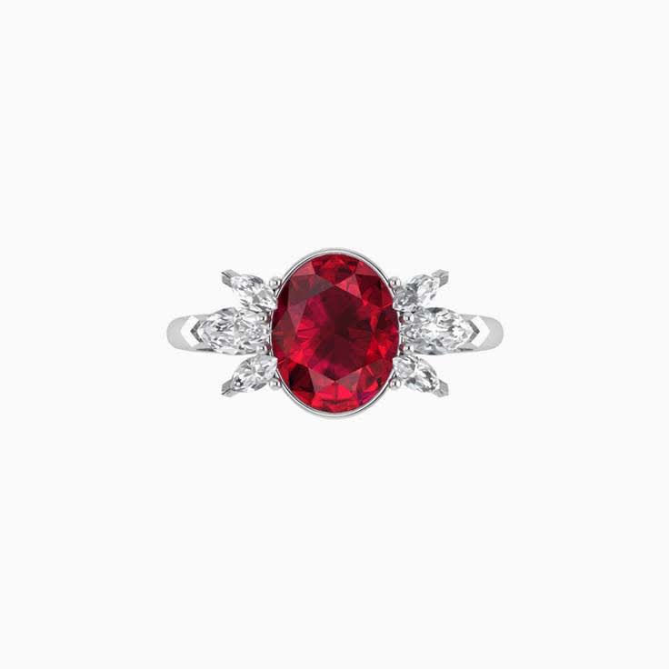 Oval ruby ring with marquise diamond