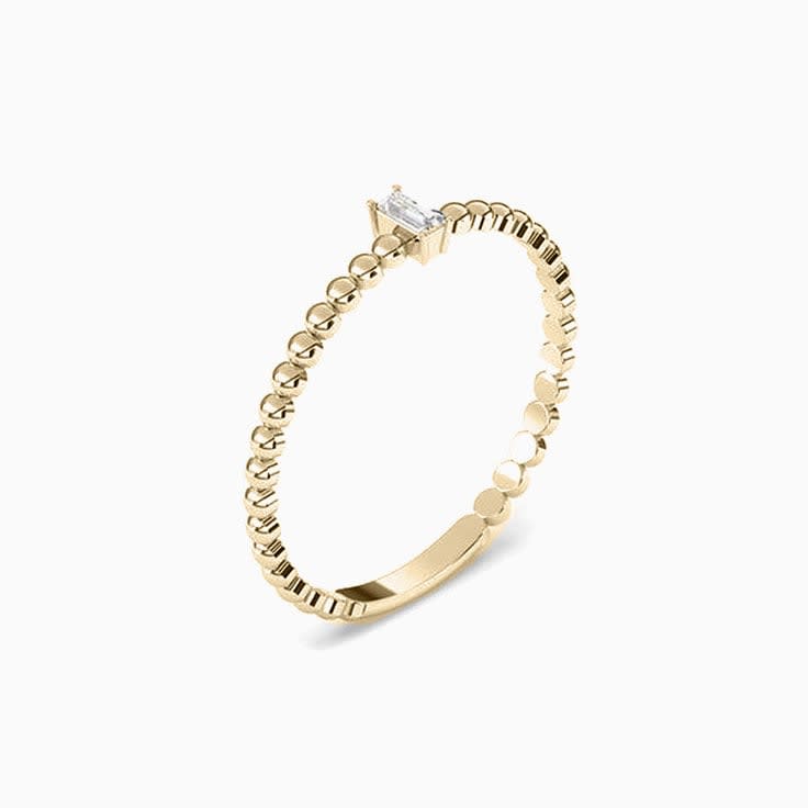 Petite baguette cut diamond ring