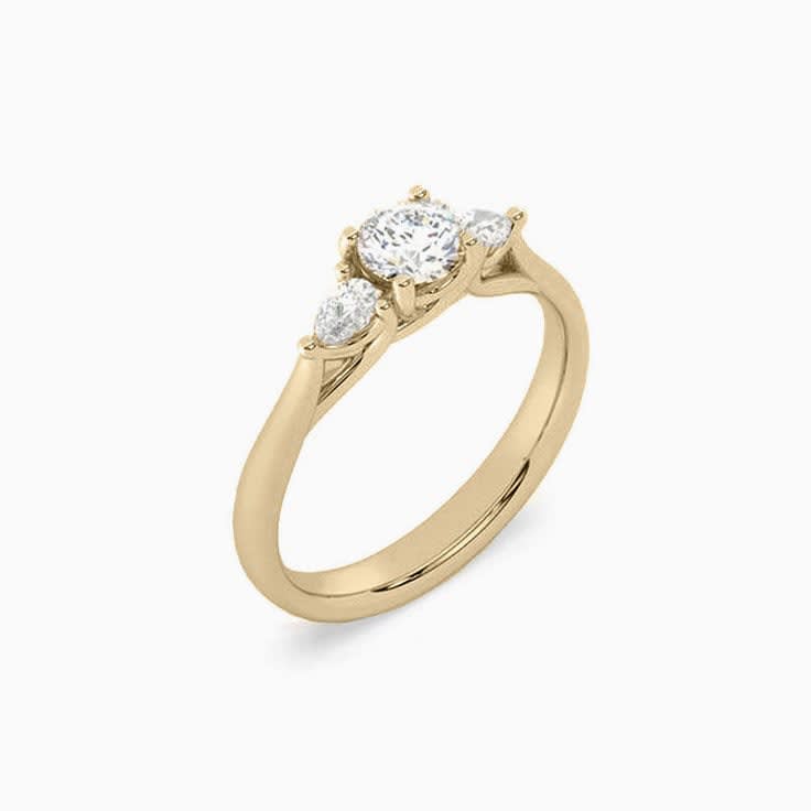 Half carat round trilogy ring