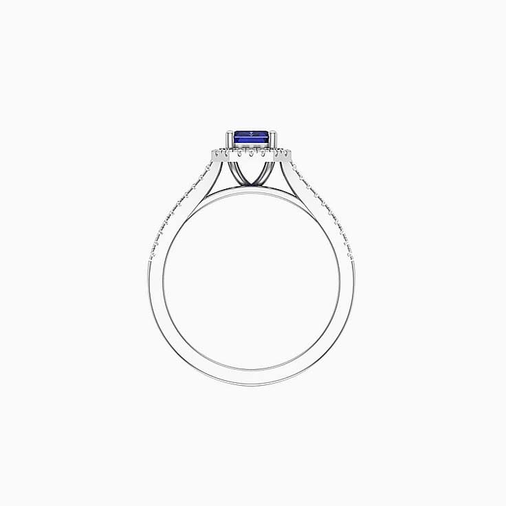 Tanzanite with halo engagement ring