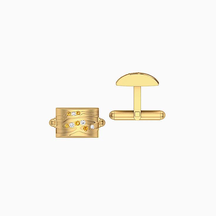 Cufflinks with white and champagne diamonds.