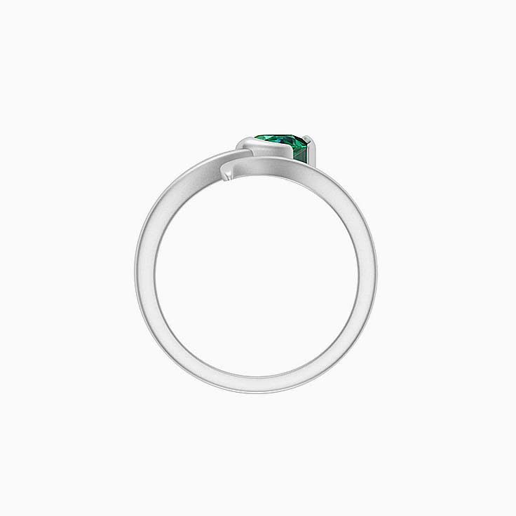 Swirl ring with an Emerald