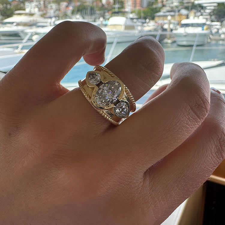 Solid gold ring with oval lab diamond