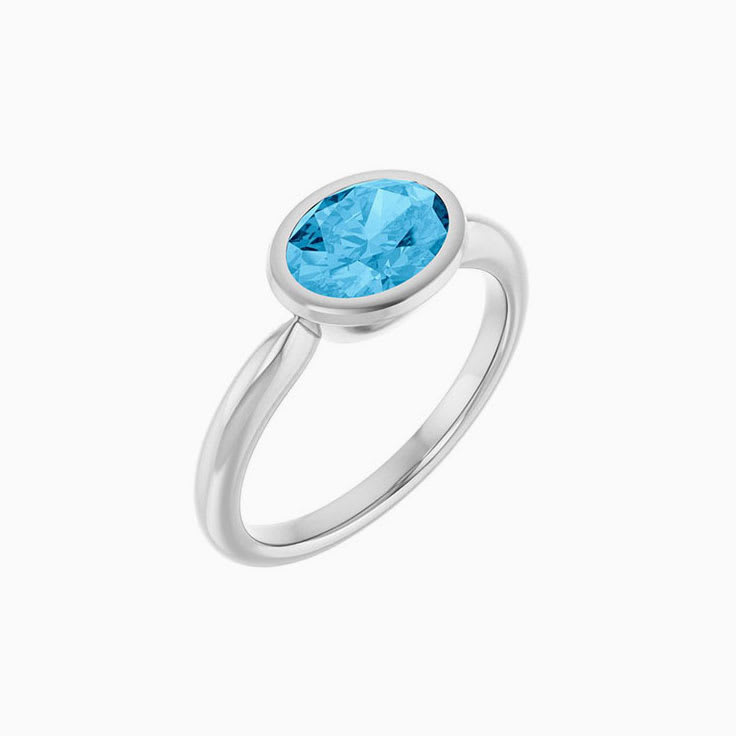 oval Swiss Blue Topaz Ring