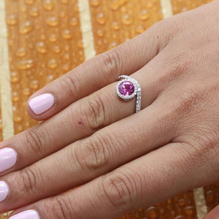 Round pink tourmaline with diamond