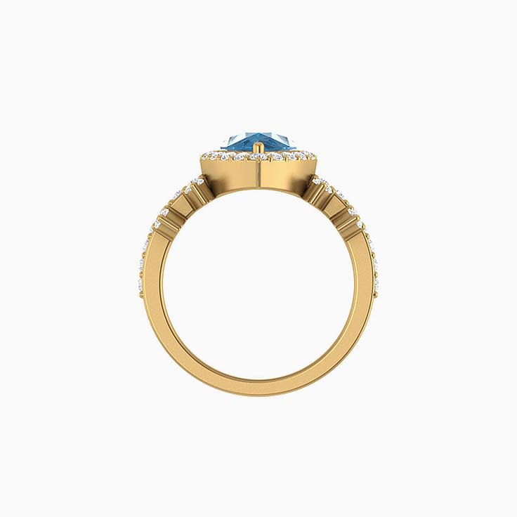 Pear cut London Blue Topaz with natural diamonds