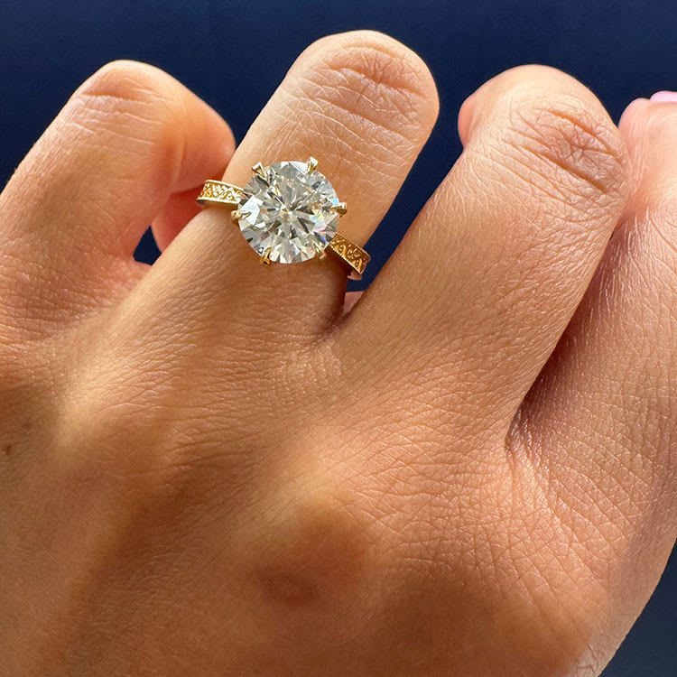 3 carat round brilliant cut in vintage tulip setting