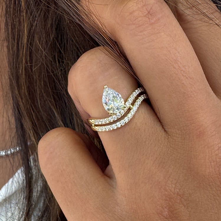 Pear double band solitaire ring