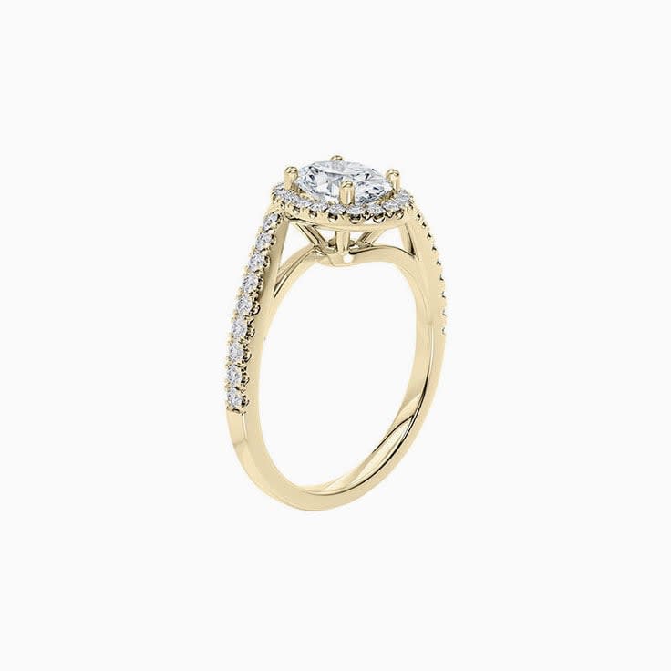 Oval Diamond With Halo and Diamond Band