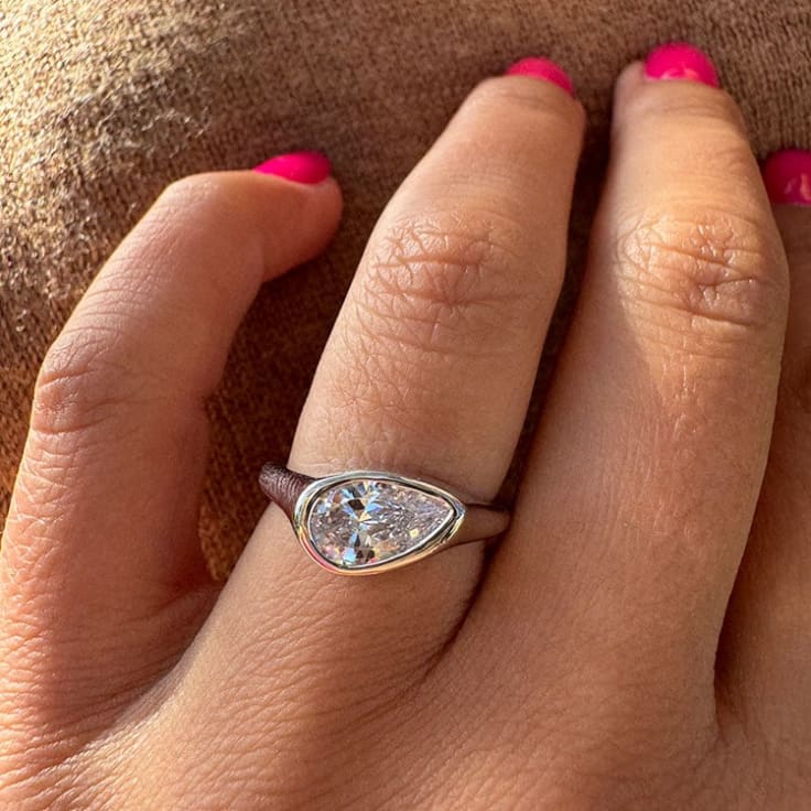 Pear diamond Bezel set on a solid band