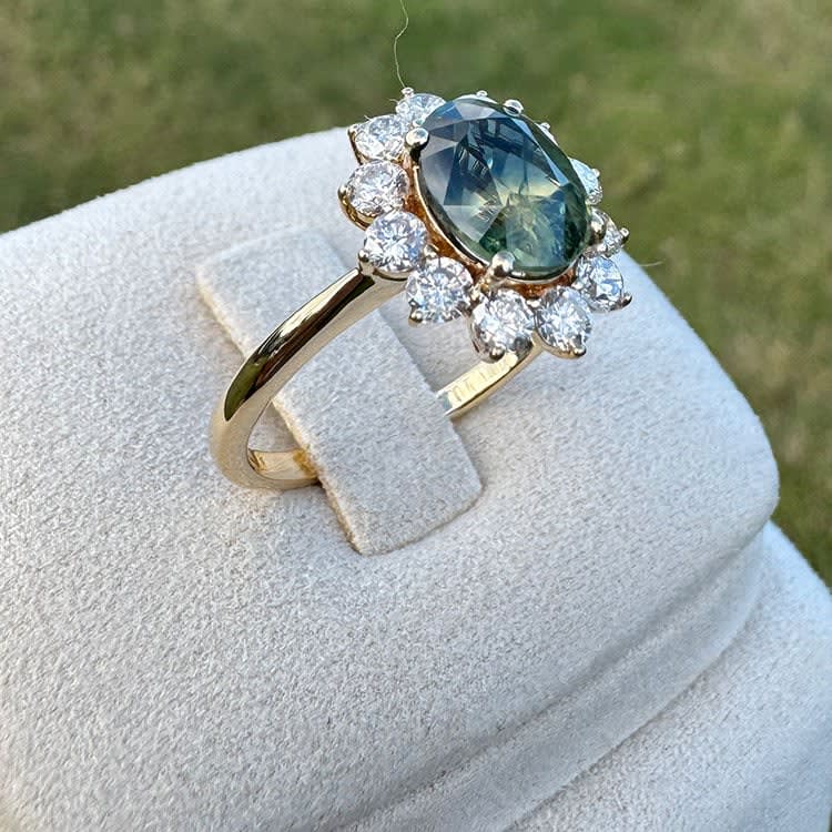 Oval Natural teal sapphire and diamond ring