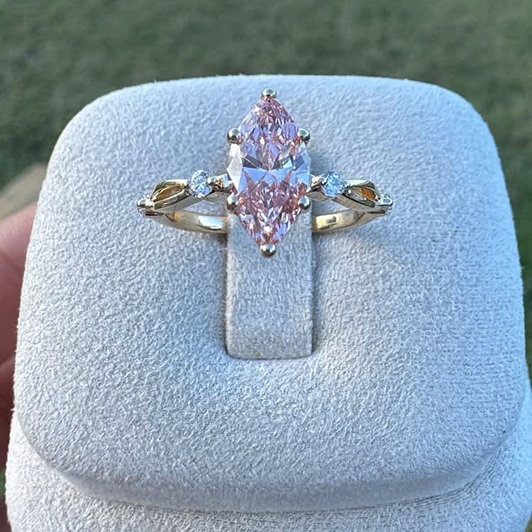 Fancy vivid pink marquise diamond ring