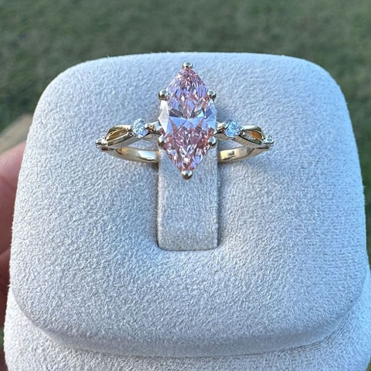 Fancy vivid pink marquise diamond ring