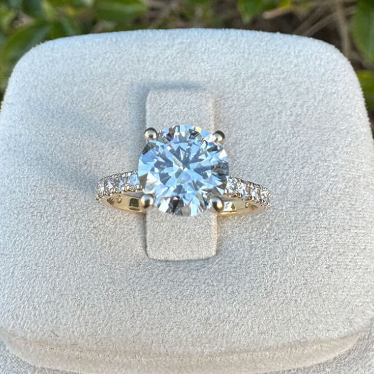 Round diamond on a diamond band