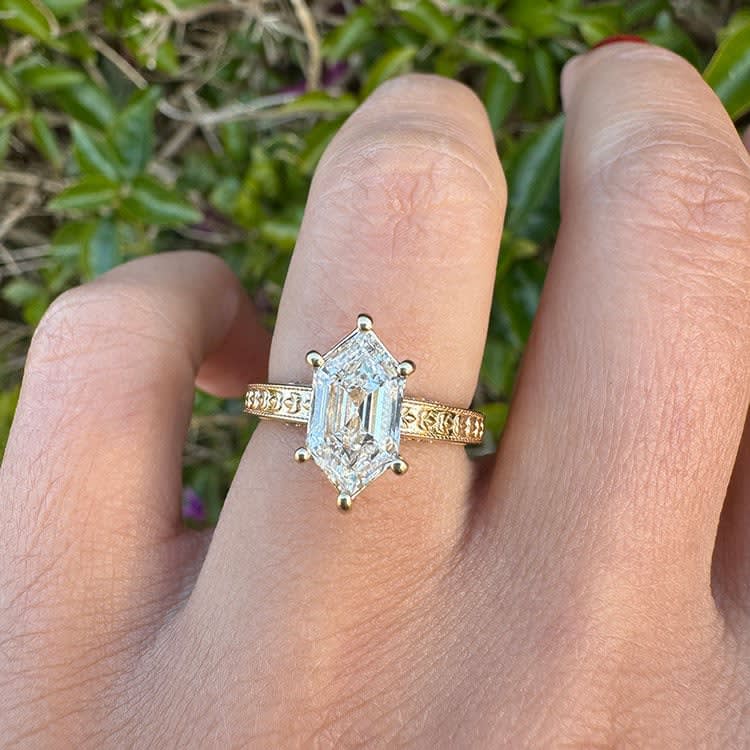 Step cut Dutch marquise on a carved band