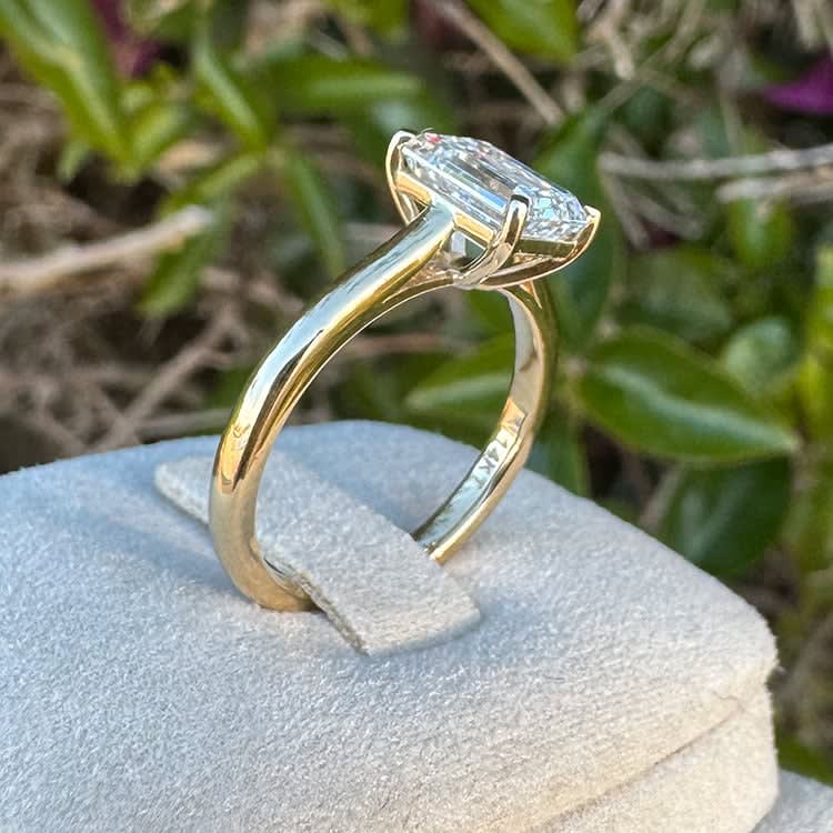 Emerald cut on a gold band
