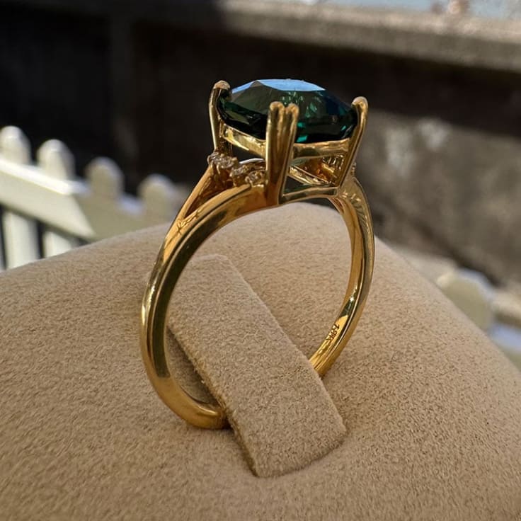 Lab green emerald on a gold band
