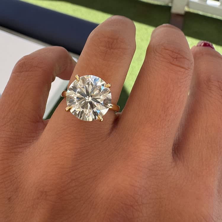 7 carat round diamond on a gold band