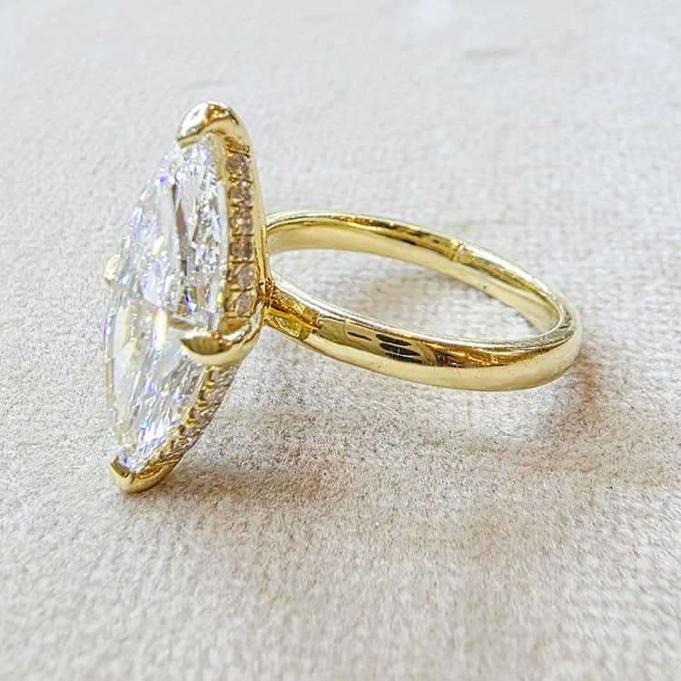 D VVS2 marquise set with hidden halo