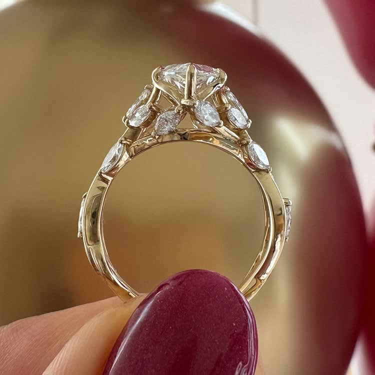 Marquise diamond ring with 3ct center stone