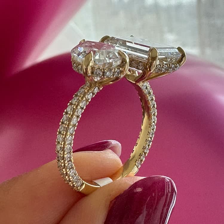Emerald and pear diamond ring