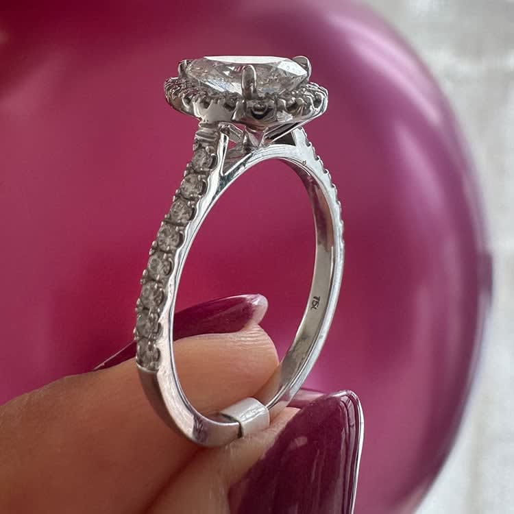 Classic pear with a halo and diamond band