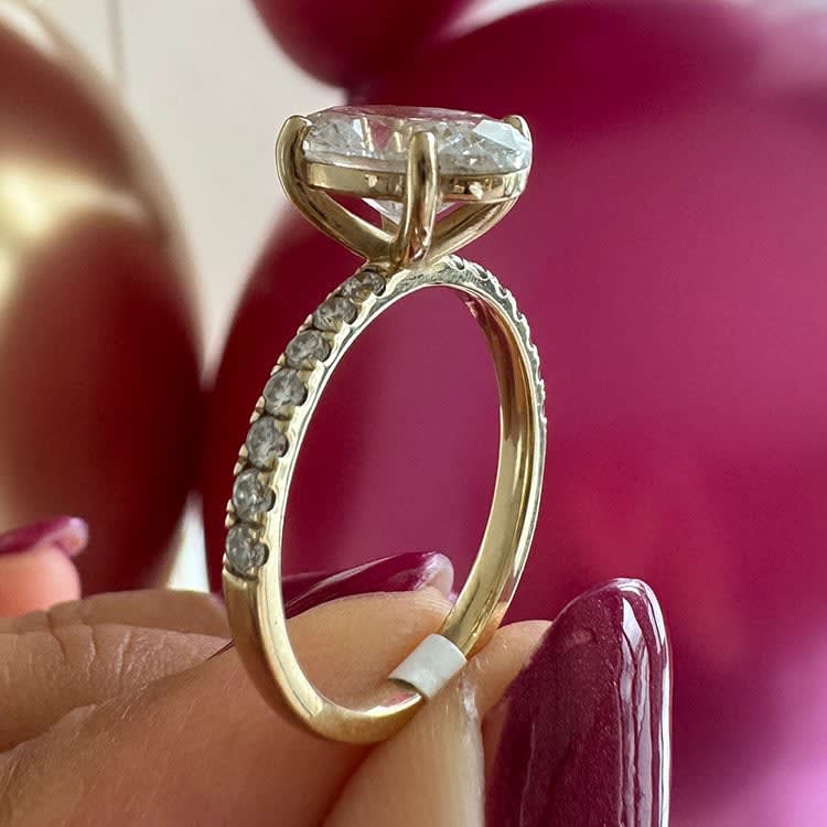 3ct oval lab diamond on a diamond band
